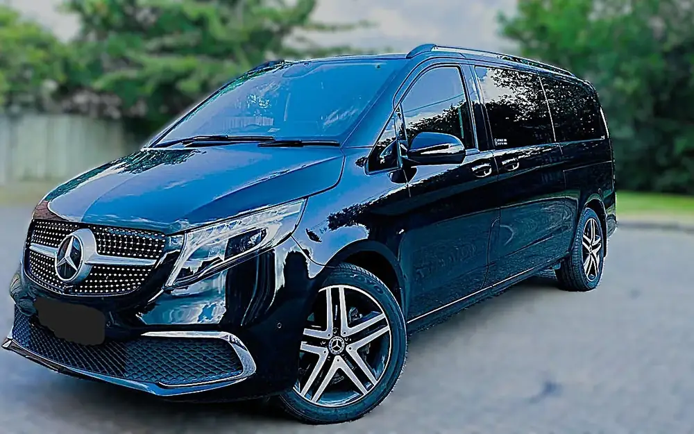 Black Mercedes V-Class 8-seat executive minibus for hire with a professional driver